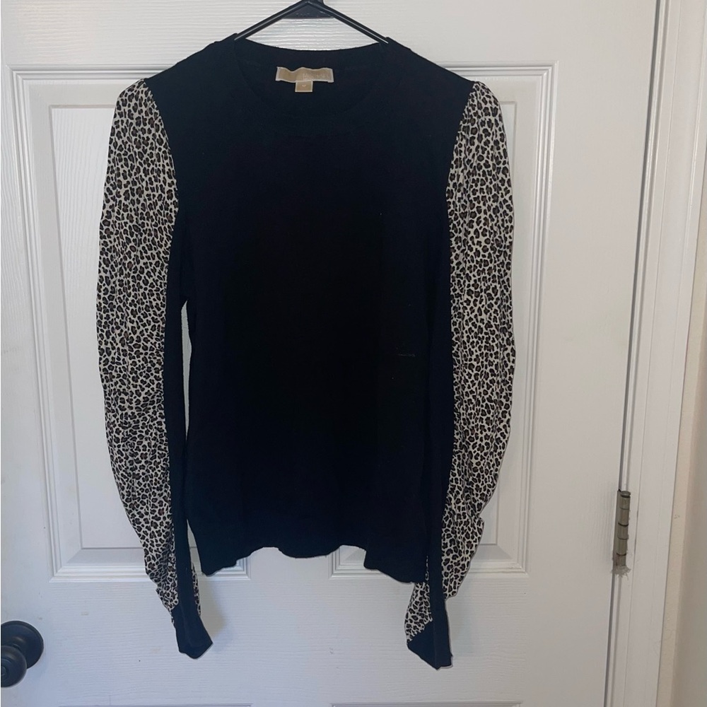 Michael Kors black sweater with ruffled leopard print sleeves. Great condition